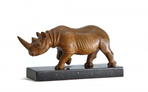 A Rhino Carved in Walnut by Stan Moxom at The Sculpture Park 