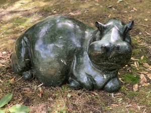 Relaxing Hippo by Timothy Rukodzi at The Sculpture Park